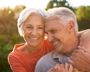 Portrait,Of,Loving,Senior,Couple,On,Hugging,Outdoors,In,Countryside